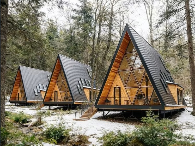 A-frame cabins dusted with snow