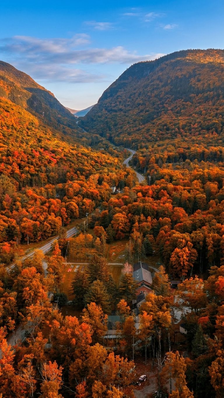 The town of Hunter in its valley, hillsides in deep autumn color