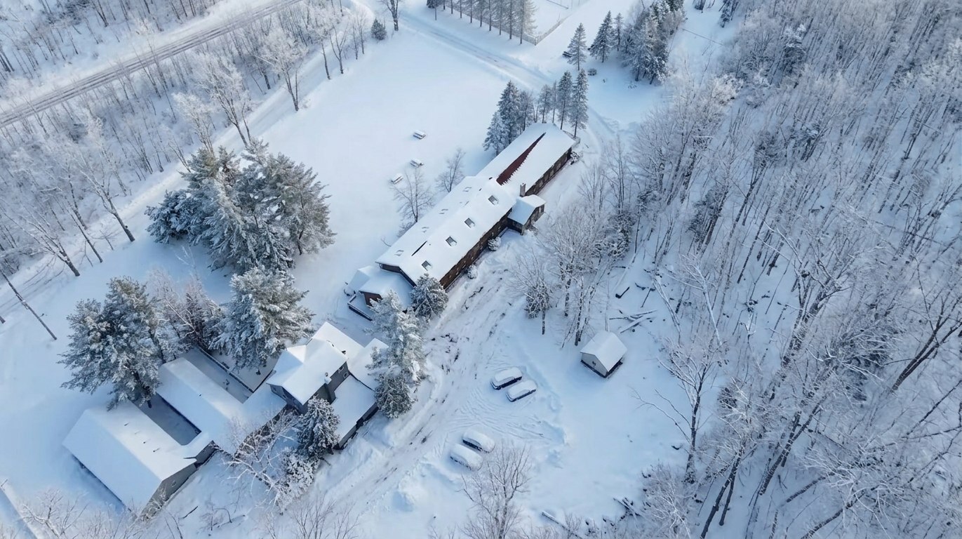 The resort grounds covered in deep snow, seen from above